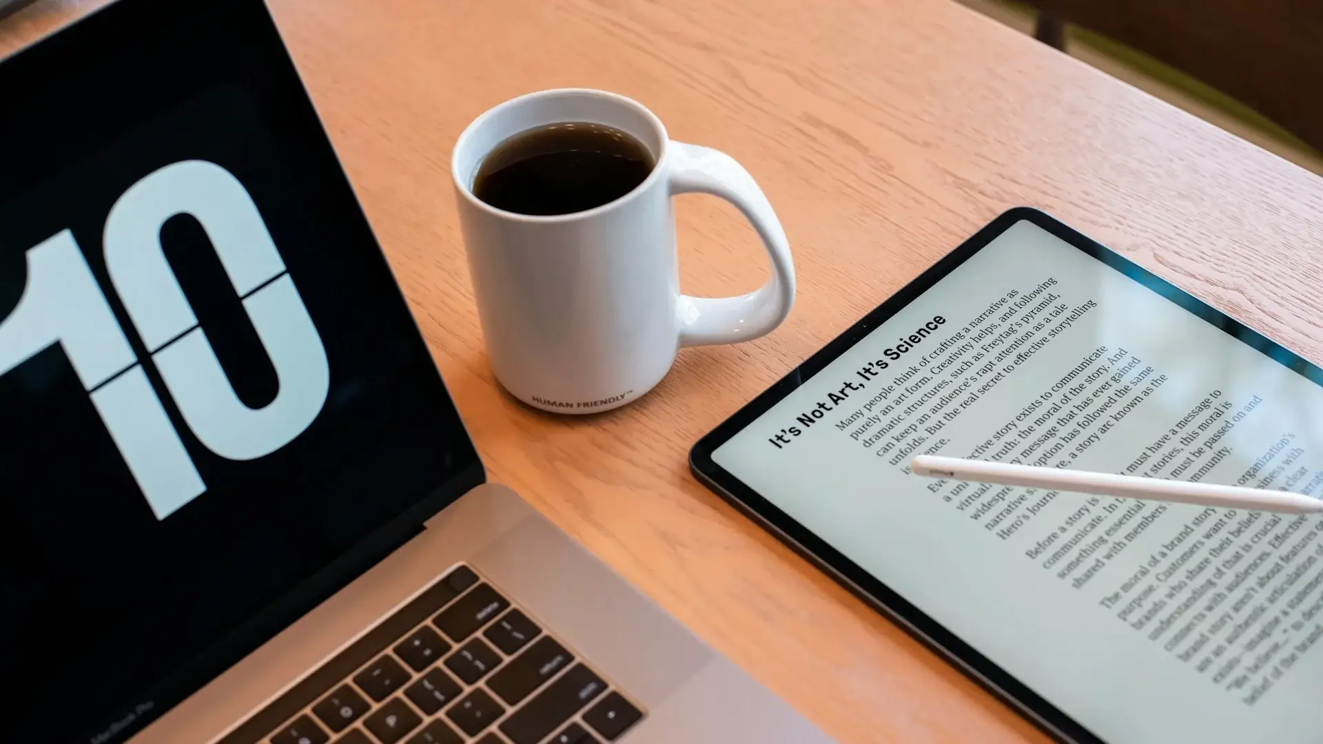 Laptop and tablet showing newsletter content